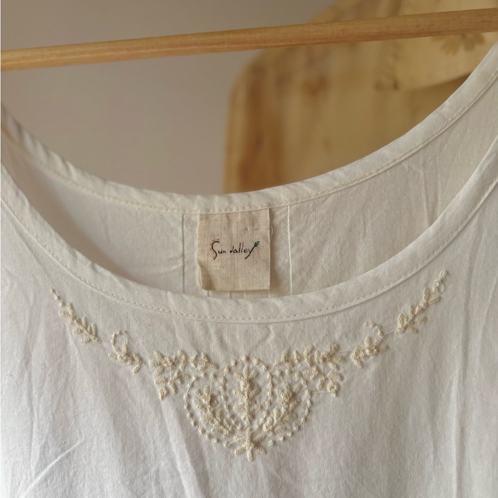 White Sleeveless Summer Dress with Subtle Lace Detail - Picture 2 of 5